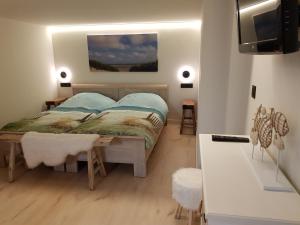 Nieuw app met tuin en terras, gratis parking, aan zee, vlakbij Brugge
