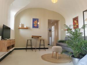 Appartements Studio 30m2, 7 mn de la plage, au coeur de Calcatoggio. : photos des chambres