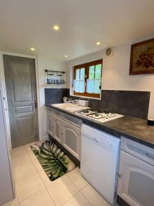 Maisons de vacances Maison de charme avec jacuzzi. : photos des chambres