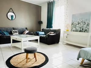 Appartements La Plume Wifi Parking Un-Sejour-a-Part : photos des chambres