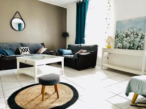 Appartements La Plume Wifi Parking Un-Sejour-a-Part : photos des chambres