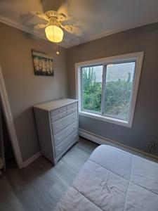 Beachy Bay Breeze Bungalow 2BR with parking and close to many amenities.