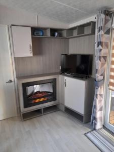 Campings le mobile home Le Victory situe au Camping Le Rio : photos des chambres