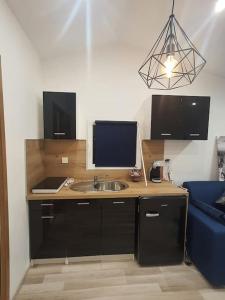 Appartements Studio agreable : photos des chambres