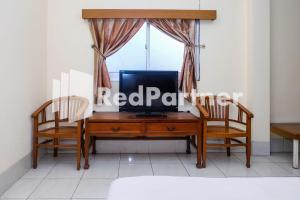 Hotel Sebelas at Jalan Palasari Mitra RedDoorz