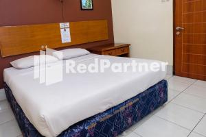 Hotel Sebelas at Jalan Palasari Mitra RedDoorz