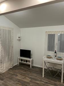 Appartements L'Arcachonaise - Studio cosy avec jardin a Begles : photos des chambres