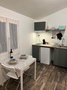 Appartements L'Arcachonaise - Studio cosy avec jardin a Begles : photos des chambres