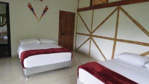 Las cabañas del escobo-CABAÑA GUACAMAYAS