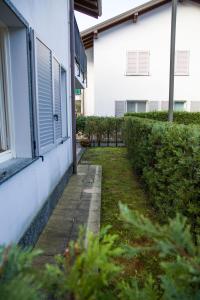 Appartamento con giardino e parcheggio privato