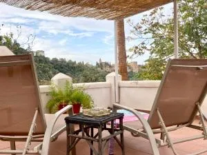 Cueva con vistas a la Alhambra - Гранада