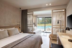 Junior Suite with Pool View & Swim Up Pool room in Amilia Mare Rhodes