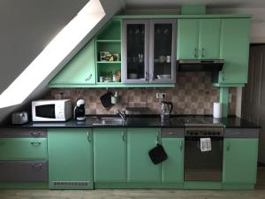 Hangulatos társasházi apartman Pécs belvárosában