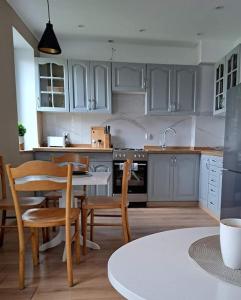 Apartamenty i Pokoje Piaskowy Mak