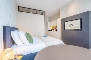 Appartements Yuna Les Halles - Serviced Apartments : photos des chambres