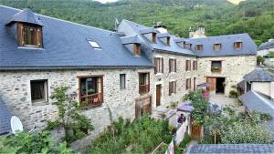 Maisons de vacances Maison de 4 chambres avec jacuzzi terrasse amenagee et wifi a Guchan a 4 km des pistes : photos des chambres