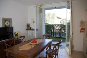 Appartamento con giardino e parcheggio privato