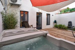 Maisons de vacances Melina - jacuzzi - maison avec cour climatisee proche cite medieval : photos des chambres
