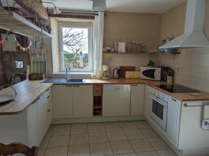 Maisons de vacances Maison familiale avec grand jardin pres du Perigord - 3 chambres, WIFI et velos fournis - FR-1-653-171 : photos des chambres
