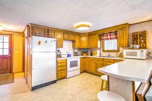 Scenic Lyman Home on Swan Pond with Wraparound Deck!