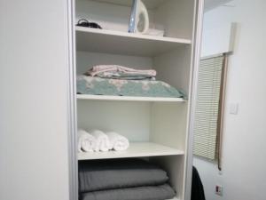 Apartamento aconchegante com estacionamento na 25 de março