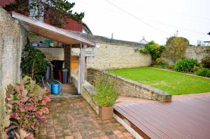 Maisons de vacances Le Break - maison de plain-pied avec jardin : photos des chambres
