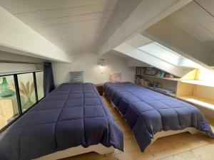 Maisons de vacances Charmante petite maison avec jardin plage des vieilles : photos des chambres