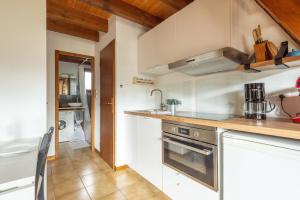 Appartements Les Louveteaux : photos des chambres