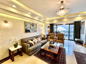 Luxury hotel apartment with pools in front AUC