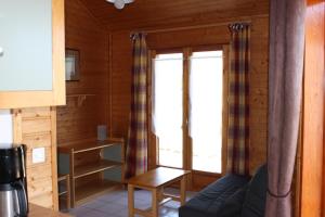 Campings Volcans Vacances Les Chalets Du Lac : photos des chambres