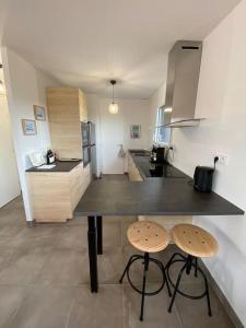 Villas Maison neuve, chaleureuse, vue sur L'Aber Benoit : photos des chambres