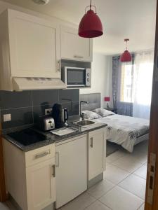 Appartements Studio a 300 m de la gare de Mantes-la-Jolie : photos des chambres