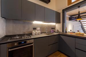 Industrial design loft with outdoor living terrace