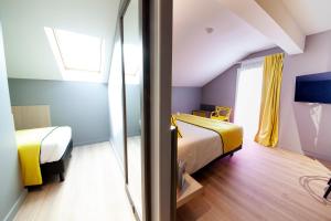 Hotels Quality Hotel Clermont Kennedy : Suite avec 1 Lit Queen-Size et 1 Lit Simple - Non-Fumeurs