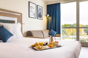 Hotels Novotel Senart Golf De Greenparc : photos des chambres