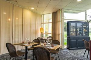 Hotels Novotel Senart Golf De Greenparc : photos des chambres