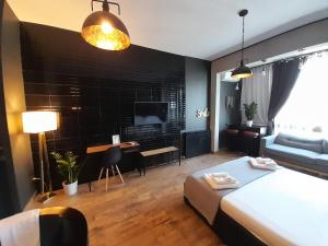 Deluxe Apartment room in Munì Boutique Flat