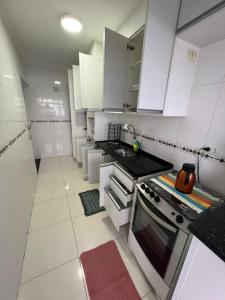 Apto 18 - Refugio Aconchegante na Praia da Enseada no Guarujá - SP