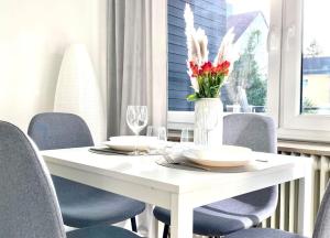 Top-Apartment mit Parkplatz und Balkon