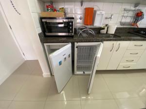 Exclusivo Quarto e Sala na Praia da Barra em Salvador - Concept House Brazil