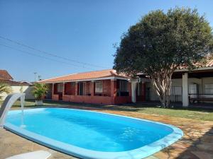 obrázek - Recanto lindo na cidade com piscina e churrasqueira