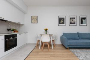 Warsaw Apartment Postępu with Parking by Noclegi Renters