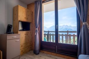 Appartements Studio with balcony and beautiful view - Alpe d'Huez - Welkeys : photos des chambres