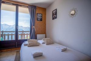 Appartements Studio with balcony and beautiful view - Alpe d'Huez - Welkeys : photos des chambres