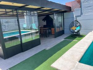 CASA con piscina temperada, tinaja y quincho próxima a Playa Sn Alfonso