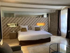 Hotels Art'Hotel & SPA Le Potin Gourmand : photos des chambres