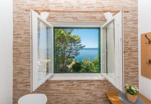 Apartments by the sea Brela, Makarska - 20186