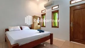 Jogo Segoro Homestay Mitra RedDoorz near Pantai Sundak Gunungkidul - Brono