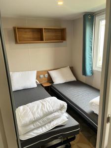 Campings Mobil home 6/8 personnes aux Mathes / La Palmyre : photos des chambres