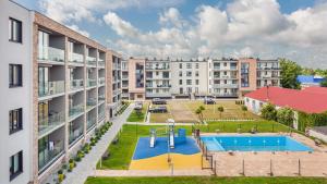 Apartament z garażem Niebieska Perła 25 G Holiday City - Perłowa Przystań